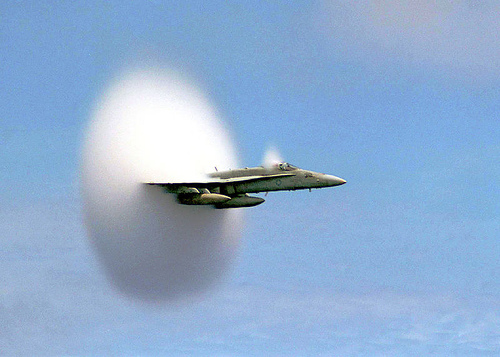 http://commons.wikimedia.org/wiki/File:FA-18_Hornet_breaking_sound_barrier_(7_July_1999).jpg