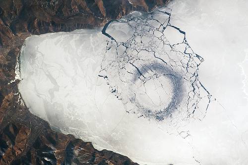 http://commons.wikimedia.org/wiki/File:Circles_in_Thin_Ice,_Lake_Baikal,_Russia.jpg