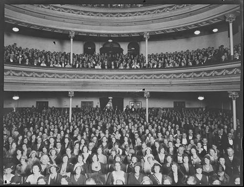 http://commons.wikimedia.org/wiki/File:His_Majesty's_Theatre,_Perth_1932_audience.jpg