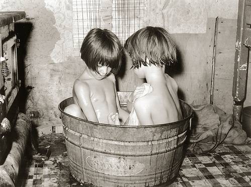 http://commons.wikimedia.org/wiki/File:KidsBathingInASmallMetalTub.jpg