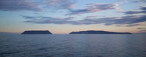 http://commons.wikimedia.org/wiki/File:Diomede_Islands_Bering_Sea_Jul_2006.jpg
