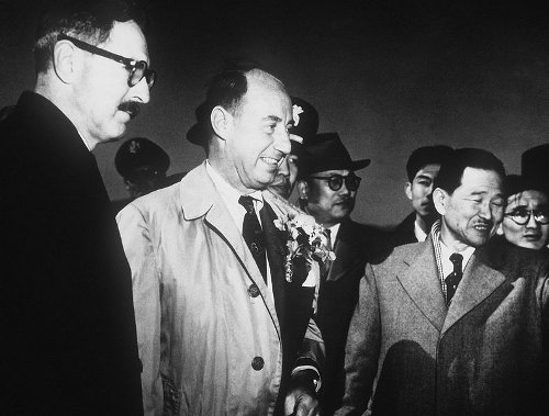 http://commons.wikimedia.org/wiki/File:Stevenson_and_Korean_officials_at_USAF_base_in_Korea,_March_1953.jpg