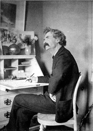 http://commons.wikimedia.org/wiki/File:Mark_Twain_pondering_at_desk.jpg