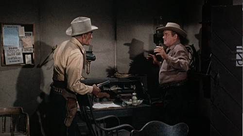 http://commons.wikimedia.org/wiki/File:Randolph_Scott_and_Barry_Kelley_in_Buchanan_Rides_Alone.png