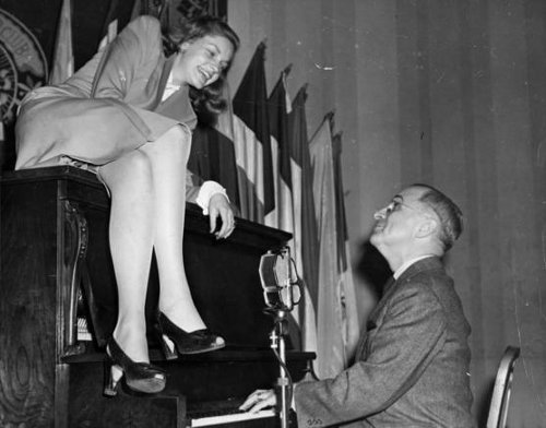 http://commons.wikimedia.org/wiki/File:Lauren_Bacall_with_Vice_President_Truman.jpg