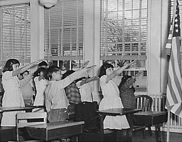 http://commons.wikimedia.org/wiki/File:Students_pledging_allegiance_to_the_American_flag_with_the_Bellamy_salute.jpg