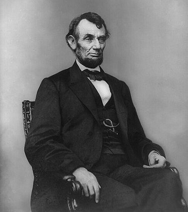 http://commons.wikimedia.org/wiki/File:Abraham_Lincoln_seated,_Feb_9,_1864.jpg