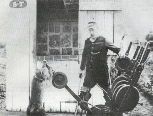 http://commons.wikimedia.org/wiki/File:Disabled_Signalman_with_his_trained_Baboon_assistant_-_Uitenhage_railway_-_Cape_Colony_1884.jpg