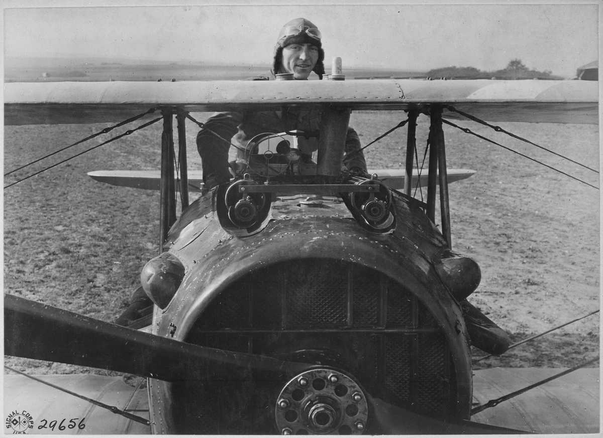 https://commons.wikimedia.org/wiki/File:First_Lieutenant_E._V._(Eddie)_Rickenbacker,_94th_Aero_Squadron,_American_ace,_standing_up_in_his_Spad_plane._Near..._-_NARA_-_530773.tif