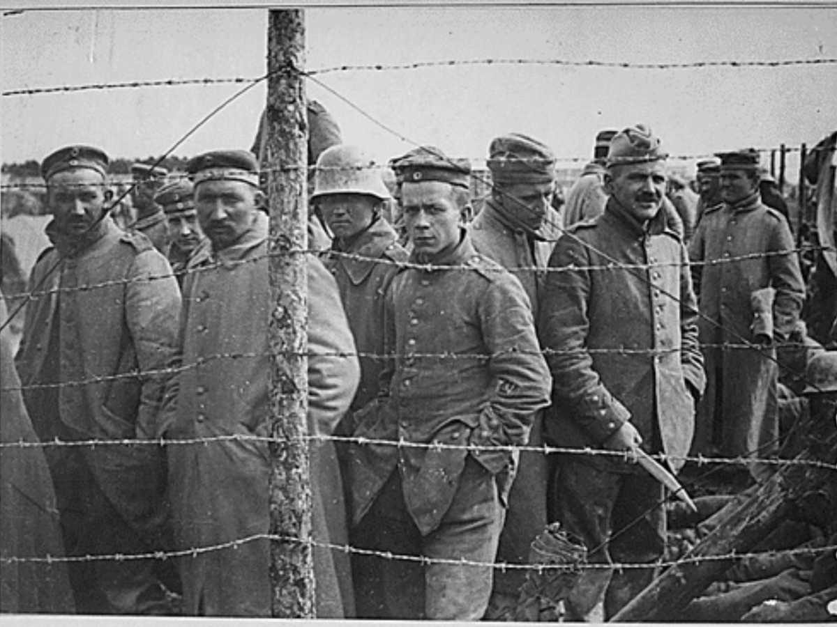 https://commons.wikimedia.org/wiki/File:German_POWs_lined_up_in_camp.png