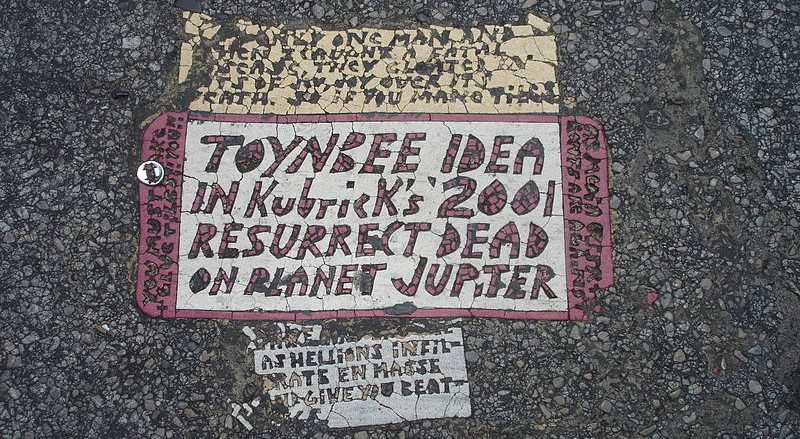 https://commons.wikimedia.org/wiki/File:Toynbee_tile_in_crosswalk_at_intersection_of_13th_and_Market_streets_Philadelphia.jpeg